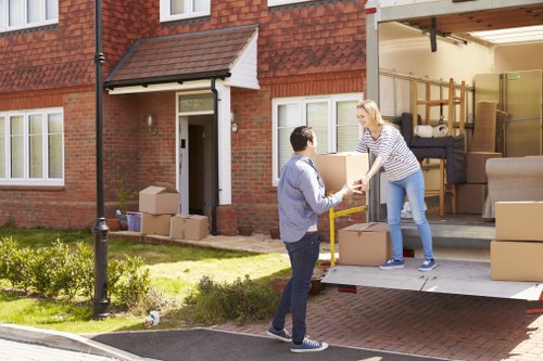 Removal van and packed boxes prepared for a home move in Haringey