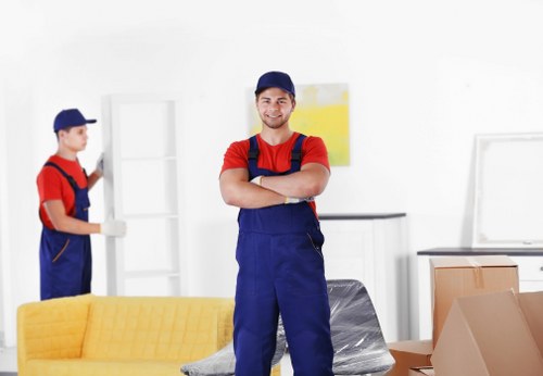 Professional movers packing and protecting household items in Haringey