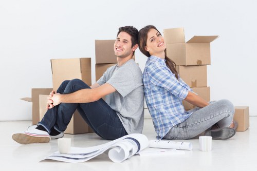 A mover navigating a Haringey property with narrow stairs and careful handling