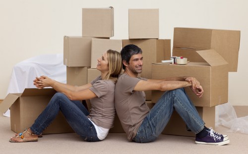 Management reviewing health and safety standards for removal operations