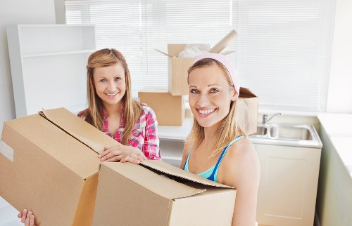 Commercial removals van loading business items in Haringey