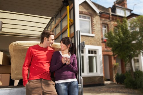 Professional movers loading furniture for a relocation in Haringey