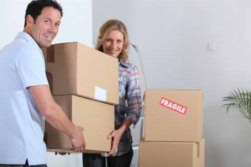 Organised moving team handling furniture in a Haringey property